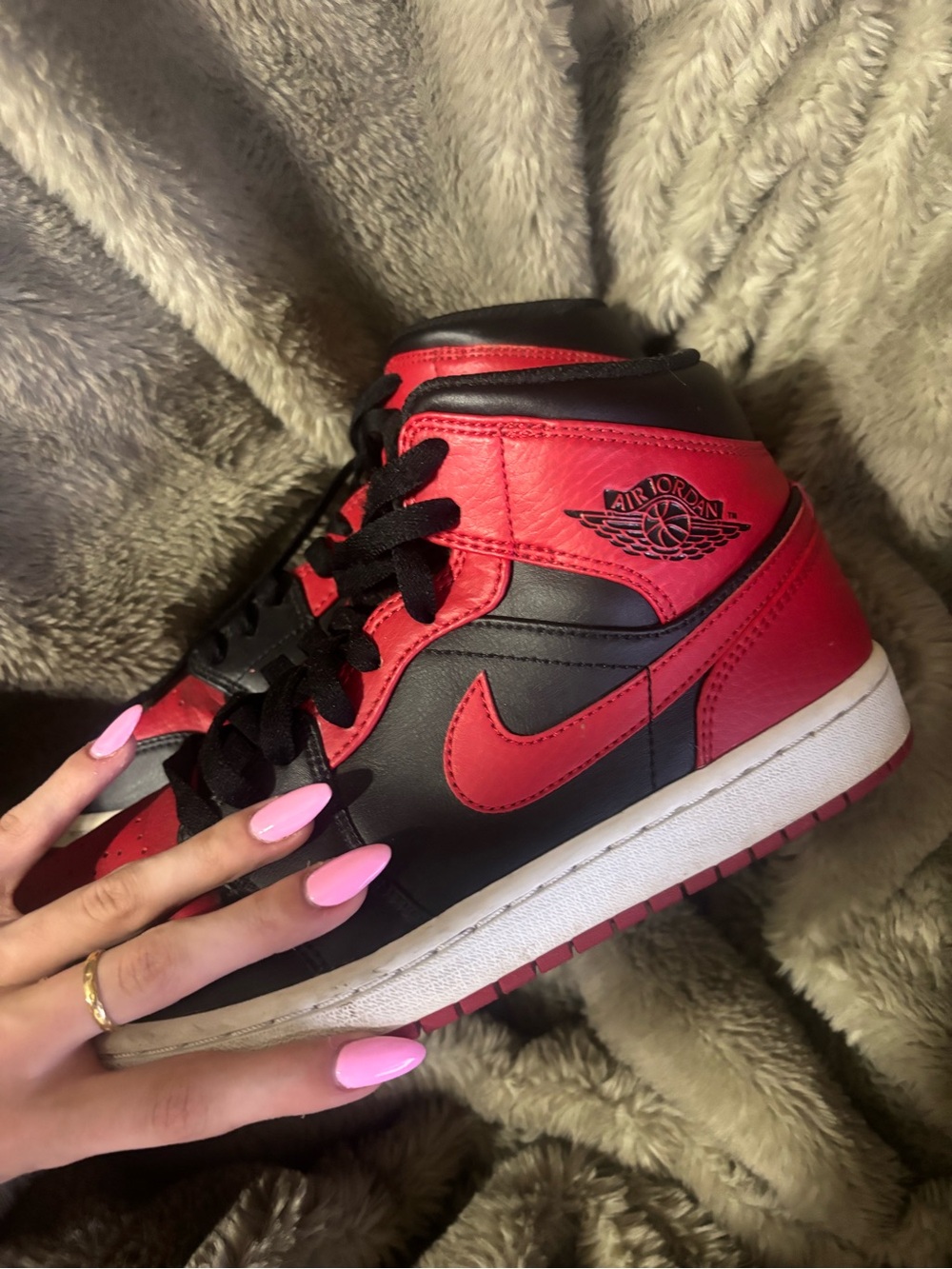 Nike Air Jordan 1 Mid in The ‘Reverse Bred’ / ‘Banned’ colourway